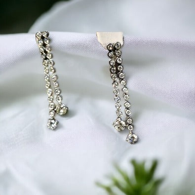 #5247 diamond earrings appraised at $8500