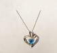 #4523 Diamond and topaz heart necklace